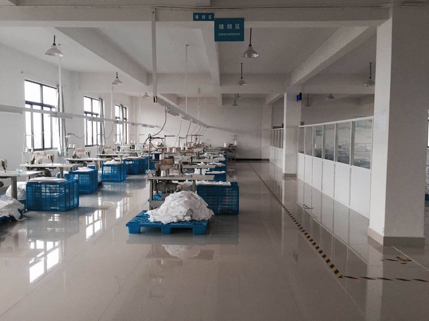 several sewing machines, ready to make the bedding products